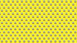 A Computer With A Minimalistic Yellow Aesthetic. Wallpaper