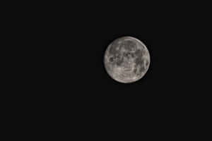 A Cool Night Sky Featuring A Crescent Moon Wallpaper