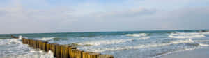 A Crystal Clear Ocean View From The Edge Of A Cliff Wallpaper