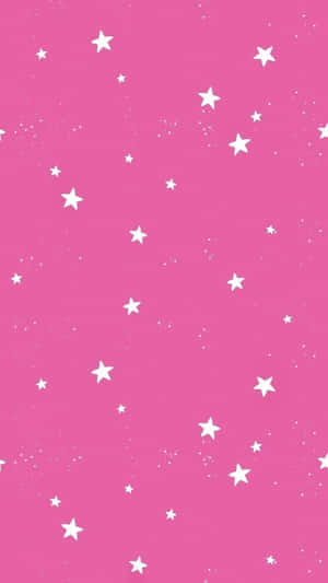 A Dazzling Display Of Pink Stars In The Night Sky Wallpaper