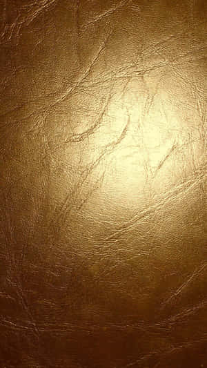 A Deep And Reflective Metallic Gold To Add A Sense Of Sophistication And Elegance To Any Setting. Wallpaper