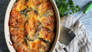 A Delicious Tray Of Moussaka Ready To Serve Wallpaper