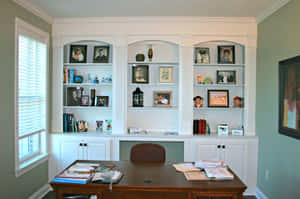 A Desk With A Picture On It Wallpaper