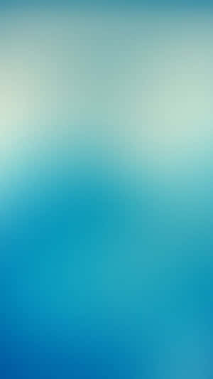 A Faded Beach Scene Along The Crystal Clear Water Of A Caribbean Paradise Wallpaper