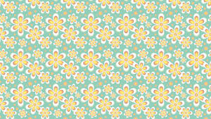 A Floral Pattern In Turquoise And Yellow Wallpaper