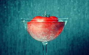 A Giant Tomato In A Wine Glass Wallpaper