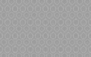 A Gray Wallpaper With A Geometric Pattern Wallpaper