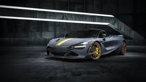 A Grey Sports Car Is Parked In A Dark Room Wallpaper