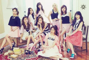 A Group Of Young Women Posing For A Photo Wallpaper