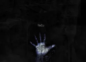 A Hand Reaching Out Of A Dark Room Wallpaper