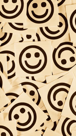 A Joyful Iphone Displaying An Uplifting Message. Wallpaper