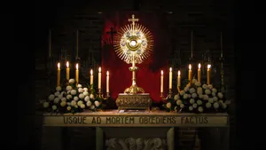 A Large Altar With Candles And Candles Wallpaper