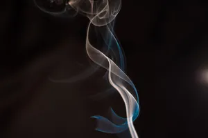 A Lighter Igniting A Cigarette Wallpaper