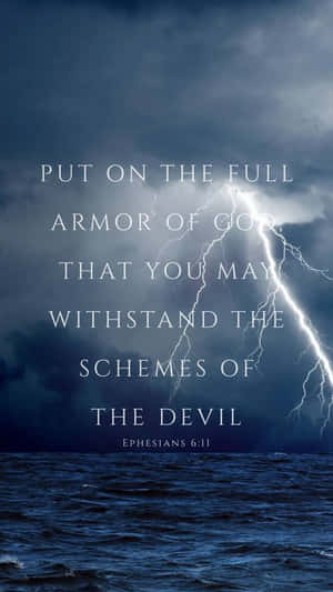 A Lightning Bolt With The Words Put On The Full Armor Of God That You May Stand Against The Schemes Of The Devil Wallpaper
