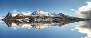 A Magnificent Reflection Of Snowy Mountains. Wallpaper