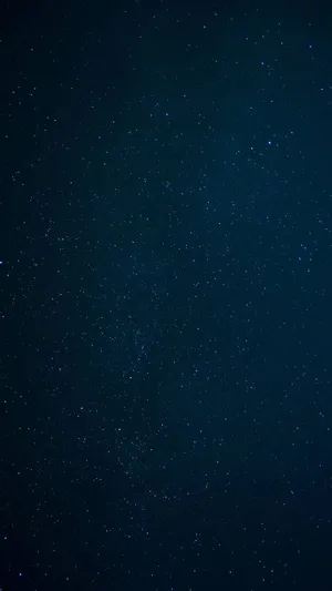 A Majestic Scene Of Stars And Galaxies Wallpaper