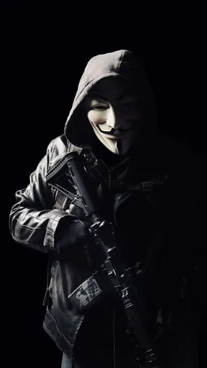 A Man In A Mask Holding A Gun Wallpaper