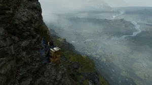 A Man Is Climbing A Cliff In A Video Game Wallpaper