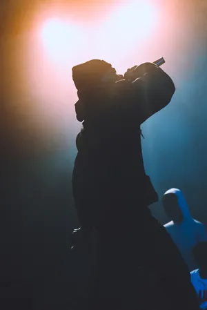 A Man Is Performing Wallpaper