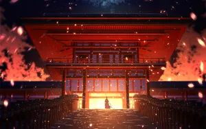 A Man Is Walking Through A Building With A Fire In The Background Wallpaper