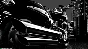 A Man Riding A Classic Harley Davidson Hd Motorcycle Wallpaper