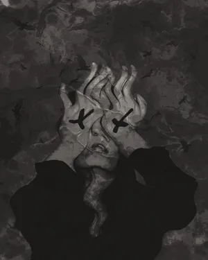 A Man Sits, Deep In Thought And Feeling A Sad Emotion Wallpaper