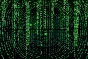 A Matrix Of Green Numbers On A Black Background Wallpaper