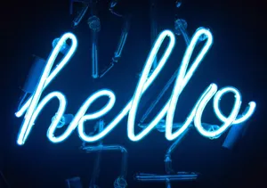 A Neon Sign That Says Hello Wallpaper