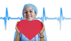 A Nurse Holding A Heart With An Ecg Wallpaper