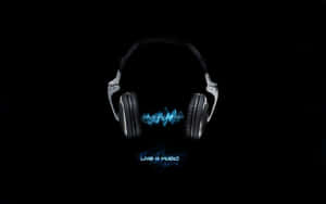 A Pair Of Headphones With The Word Dj On Them Wallpaper