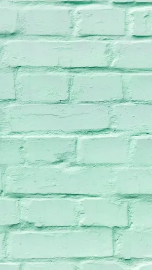 A Pastel Mint Green Background That's Perfect For Any Design Project. Wallpaper