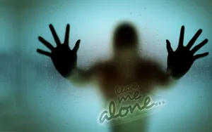 A Person With His Hands Out In Front Of A Window Wallpaper