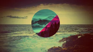 A Photo Of A Circular Image With Mountains And Ocean Wallpaper