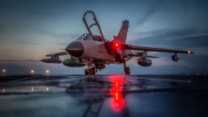 A Pilatus Pc-21 Military Aircraft Engaged In Aerobatics Wallpaper