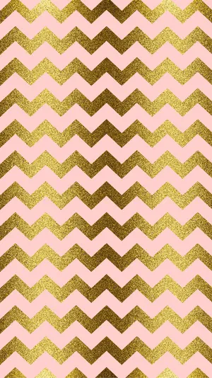 A Pink And Gold Chevron Pattern Wallpaper