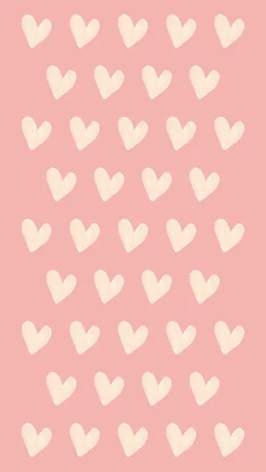 A Pink Background With White Hearts On It Wallpaper