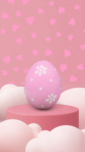 A Pink Egg On Top Of A Cloud With Hearts Wallpaper