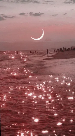 A Pink Moon And Stars On The Beach Wallpaper