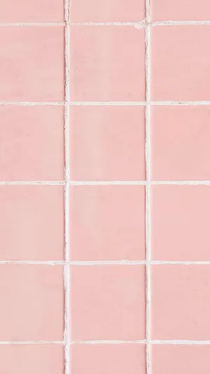 A Pink Tile With White Squares On It Wallpaper