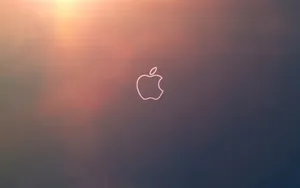 A Pristine Apple Desktop Computer - The Perfect Addition To Any Home Office Setup. Wallpaper