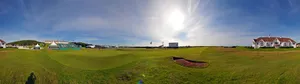 A Professional Golfer Practices His Technique On The Green. Wallpaper