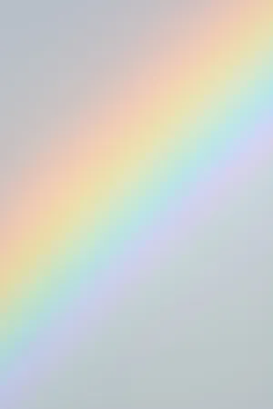 A Rainbow Is Shown On A Gray Background Wallpaper