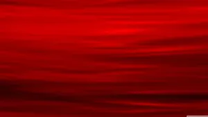 A Red Abstract Background With Waves Wallpaper