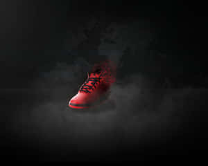 A Red Shoe With Smoke Coming Out Of It Wallpaper