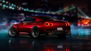 A Red Sports Car Glistening In The Hot Summer Sun. Wallpaper