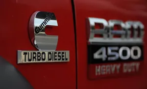 A Red Truck With A Logo That Says Turbo Diesel Wallpaper