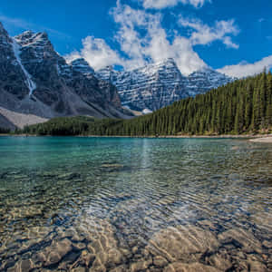 A Stunning Natural Landscape Illuminated By The Sun's Rays Wallpaper