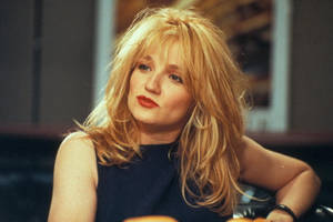 A Stunning Retro Portrait Of Young Ellen Barkin Wallpaper