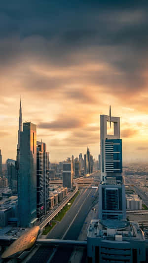 A Stunning Sunset Over A City Wallpaper