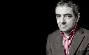 A Thoughtful Rowan Atkinson Wallpaper